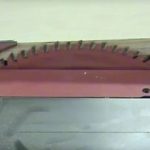tablesaw blade with board
