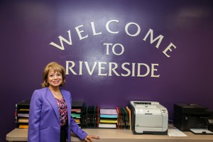 Riverside Student Services Dean Rachel Ruiz says purple accent walls help signal areas where students can get assistance.