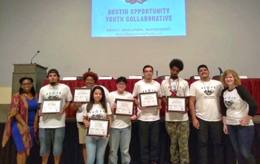 Dr. Stephanie Hawley presented certificates to AOYC Youth Ambassadors for their service to their community.