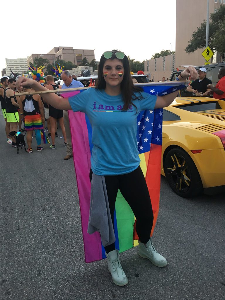 Pride Parade: holding pride flag