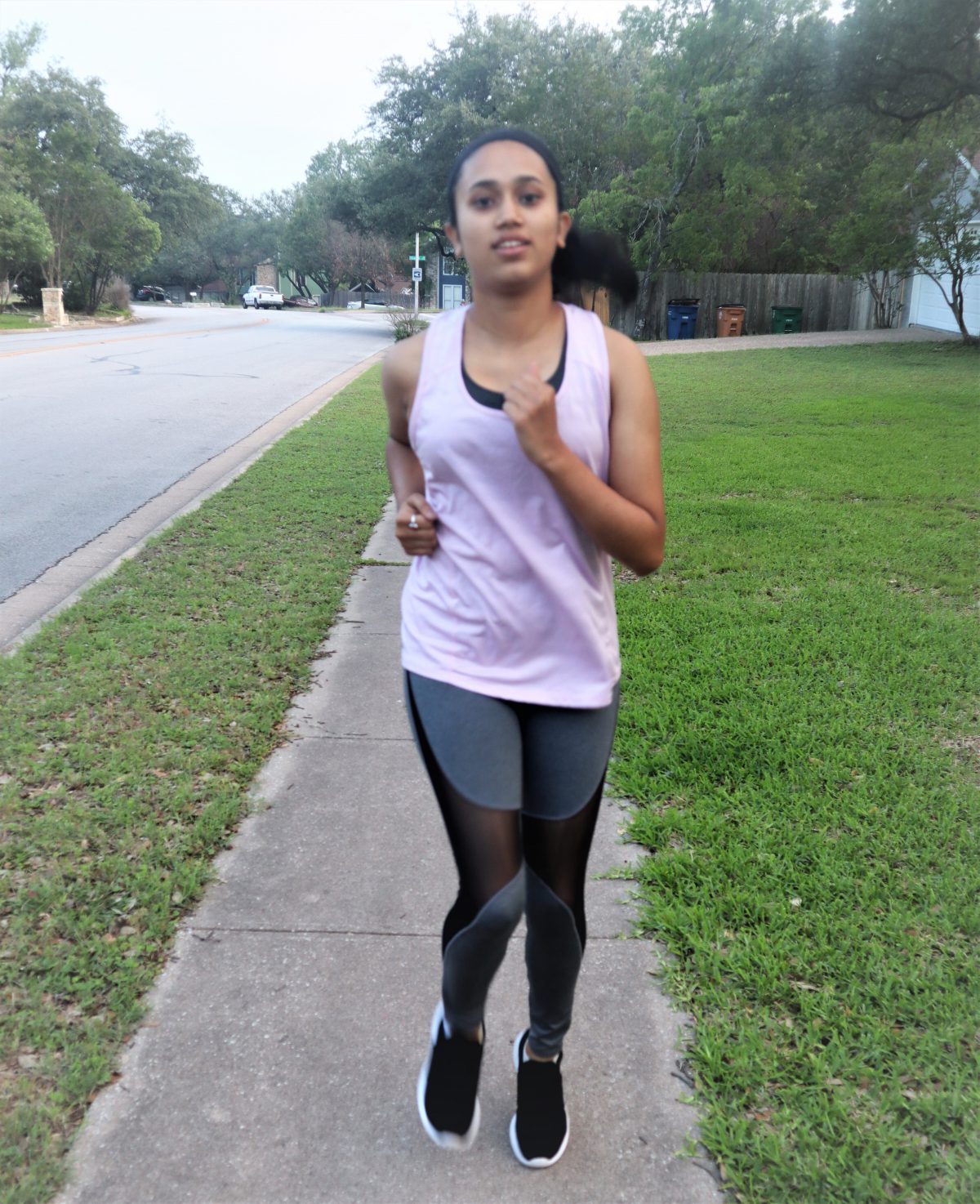 Jeshika Lamsal, prospective ACC student, runs in her neighborhood.