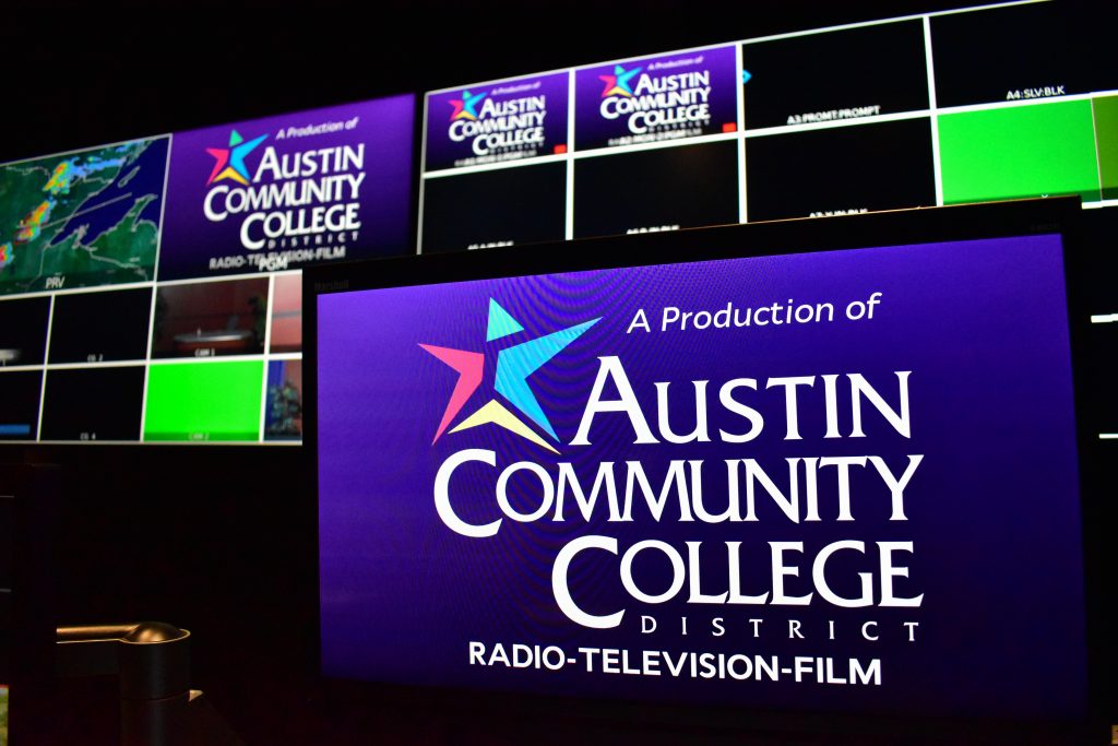 A screen shows the words "A production of Austin Community College's Radio-Television-Film" in a TV control room.