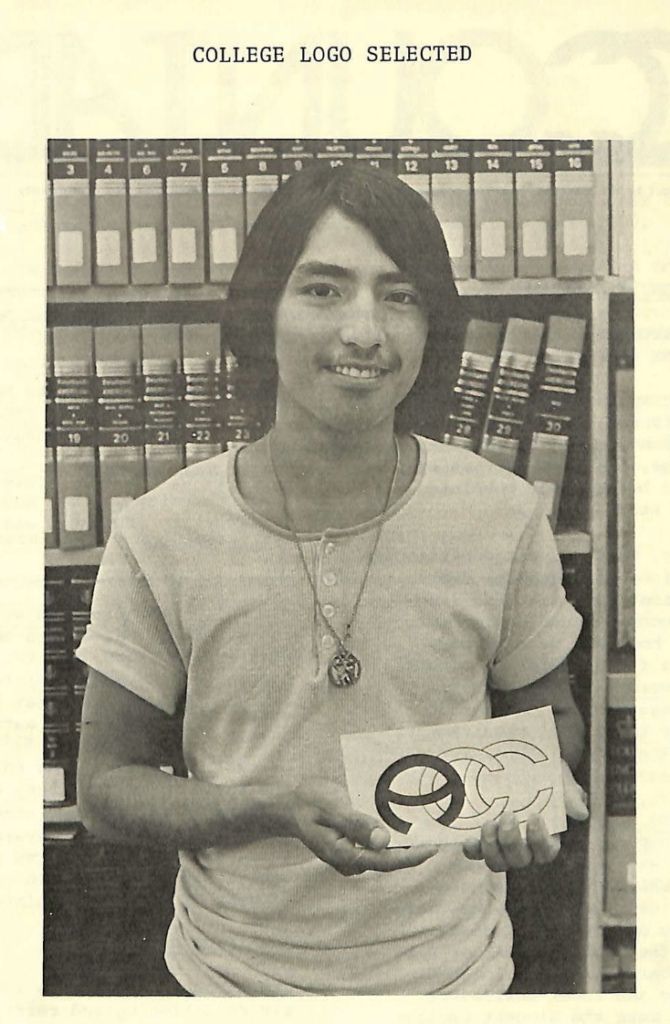 Joe Cantu holding the new logo.