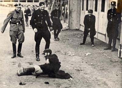German Police Tormenting Injured Jew in Poland, ca. 1939