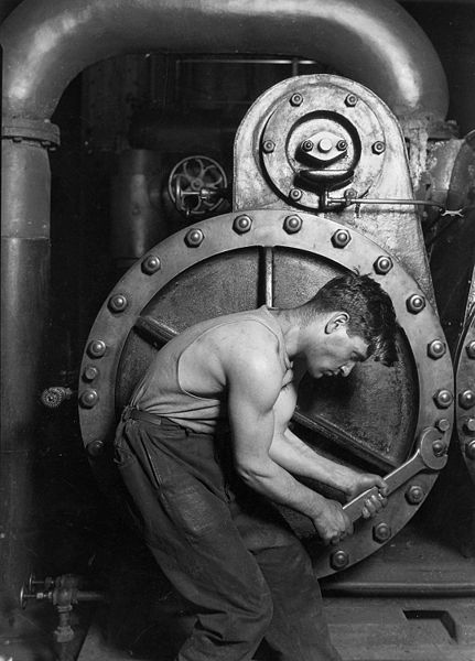 Lewis Hine, 1920. Power House Mechanic Working on Steam Pump