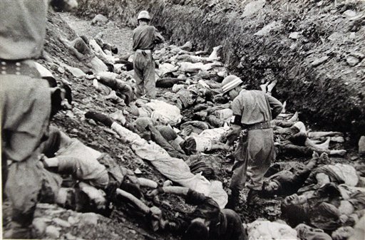 DECLASSIFIED PHOTO: South Korean Soldiers Among Some of the Thousands of South Korean Political Prisoners Shot at Taejon (now known as Daejeon), South Korea, July 1950, National Archives, Major Abbott/U.S. Army