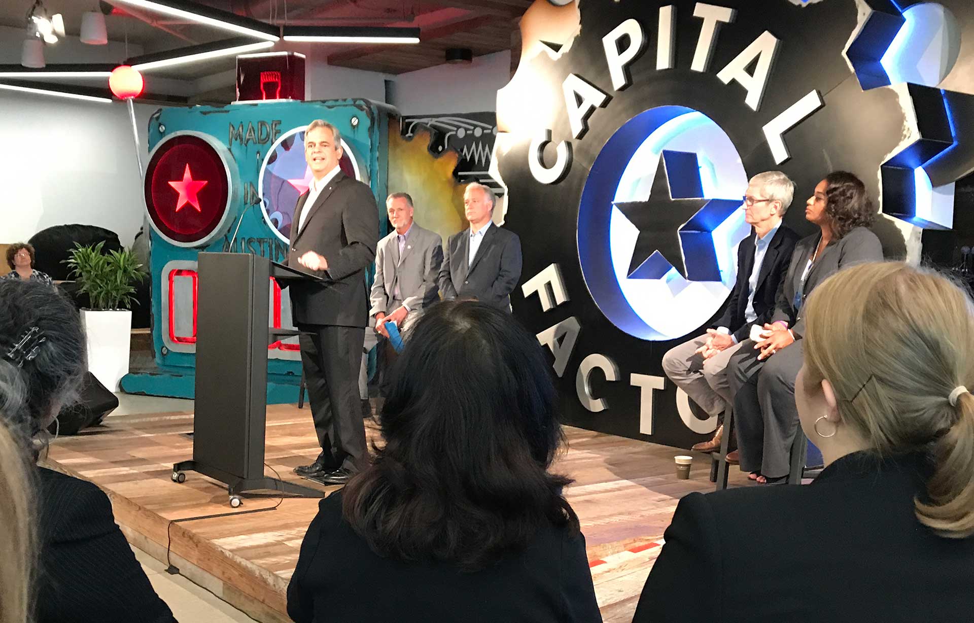 Austin Mayor Steve Adler, ACC President-CEO Richard Rhodes, Texas Senator Kirk Watson, Apple CEO Tim Cook and Keelee Mosely