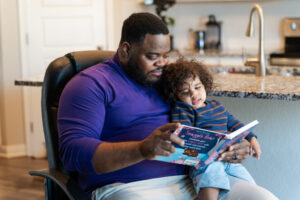 Anthony studying with his children