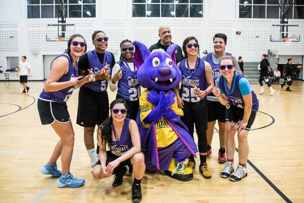 ACC Women's baskeyball team poses with R.B. the Mascot
