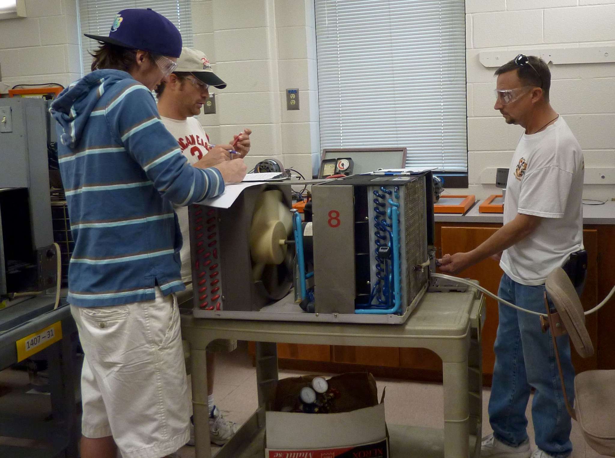 students testing room AC fan motor