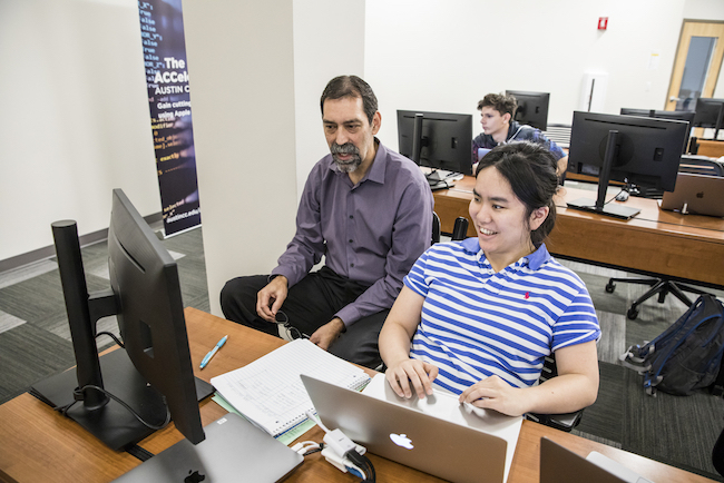 Teacher and student at SWIFT for IT Professionals I class on Thursday, March 1, 2018, at the Highland Campus Building 4000.