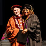 Gigi Edwards Bryant and Dr. Richard Rhodes celebrate graduation