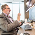 Austin Community College Chancellor Dr. Russell Lowery-Hart hosts a Student Virtual Town Hall meeting on Thursday, November 9, 2023, inside his office at ACC Highland Campus.