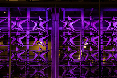 ACC Highland Campus lit purple on Thursday, September 7, 2017.