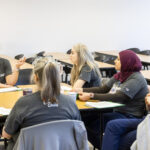 BSN students sit in a circle and talk