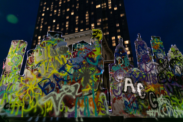 Mural with graffiti and Austin skyline