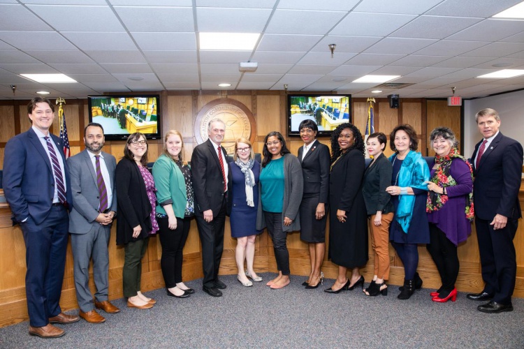 ACC administrators and trustees in ACC board room